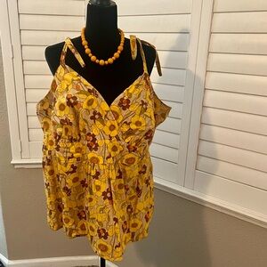 Torrid yellow and brown floral tank top.Slightly used but in excellent condition